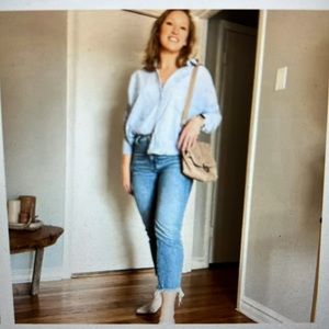 Madewell the curvy perfect vintage Jean 33 frayed hem at bottom.